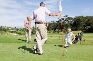 Friends playing golf